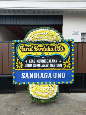 Papan Bunga Duka di Gudang Seng